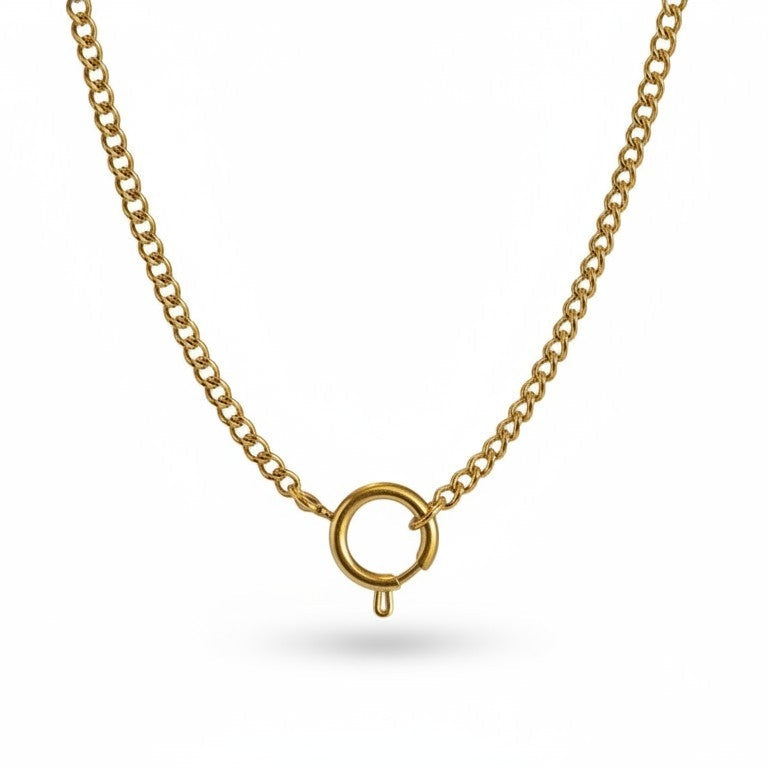 Gold necklace chain on a white background