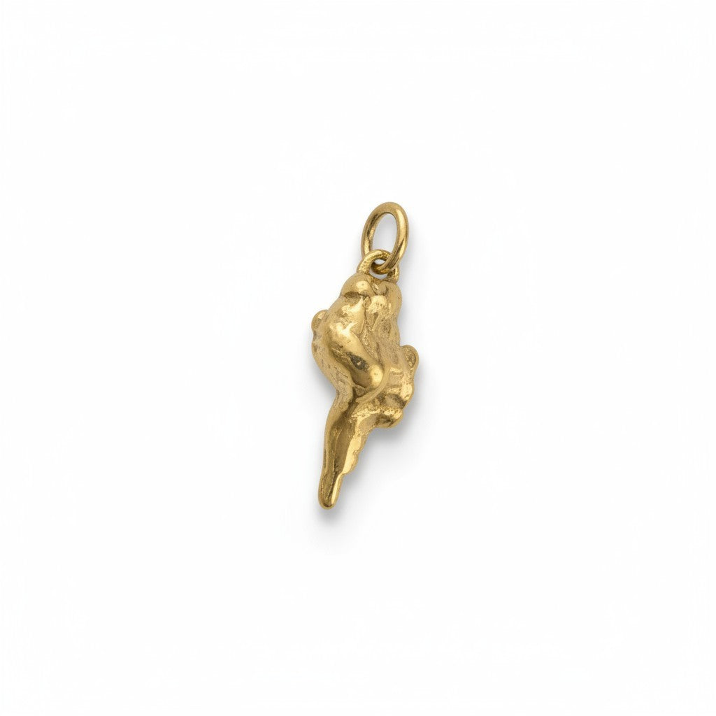 Gold shell-shaped pendant on a white background