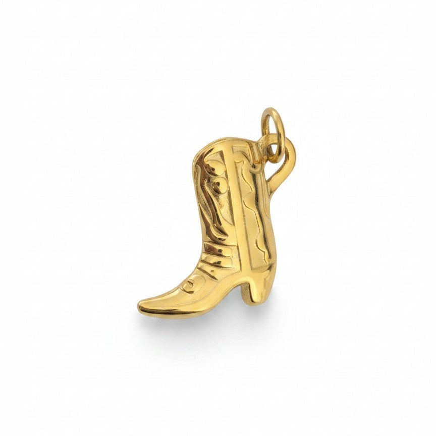 Gold cowboy boot charm on a white background