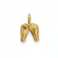 Gold charm shaped like a pair of hands on a white background