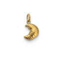 Gold elephant pendant on a white background