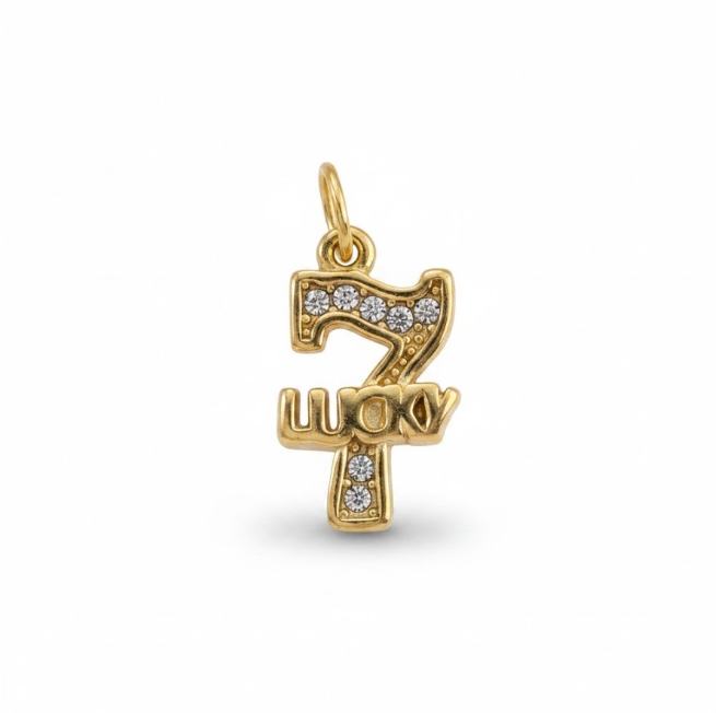 A gold charm shaped like the number seven with the word 'LUCKY' across it, embellished with small clear stones, shown on a plain white background.