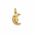 Gold moon pendant with face design on a white background