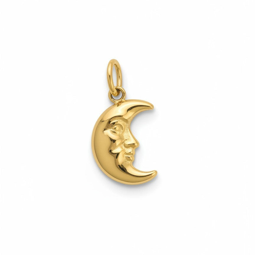 Gold moon pendant with face design on a white background