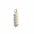 Pearl pendant with gold clasp on a white background