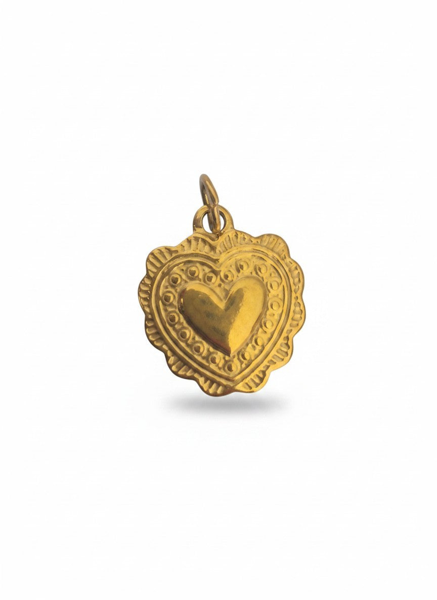 Gold heart-shaped pendant on a white background